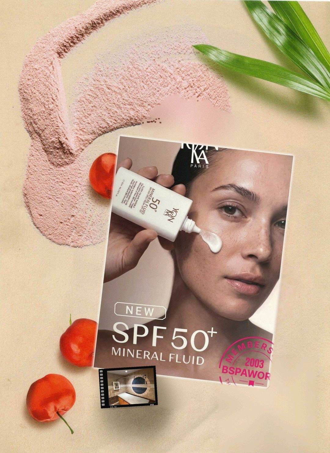 Yon-Ka Paris SPF 50+ Mineral Fluid on a bed of pink clay with acerola cherries and the Bspaworld members stamp